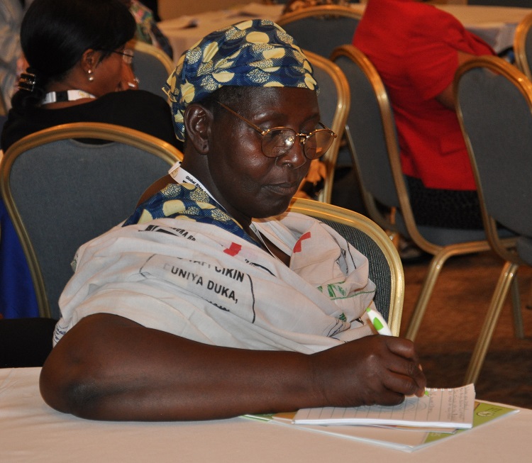 Taking notes during my product development workshop at the Global Shea Conference