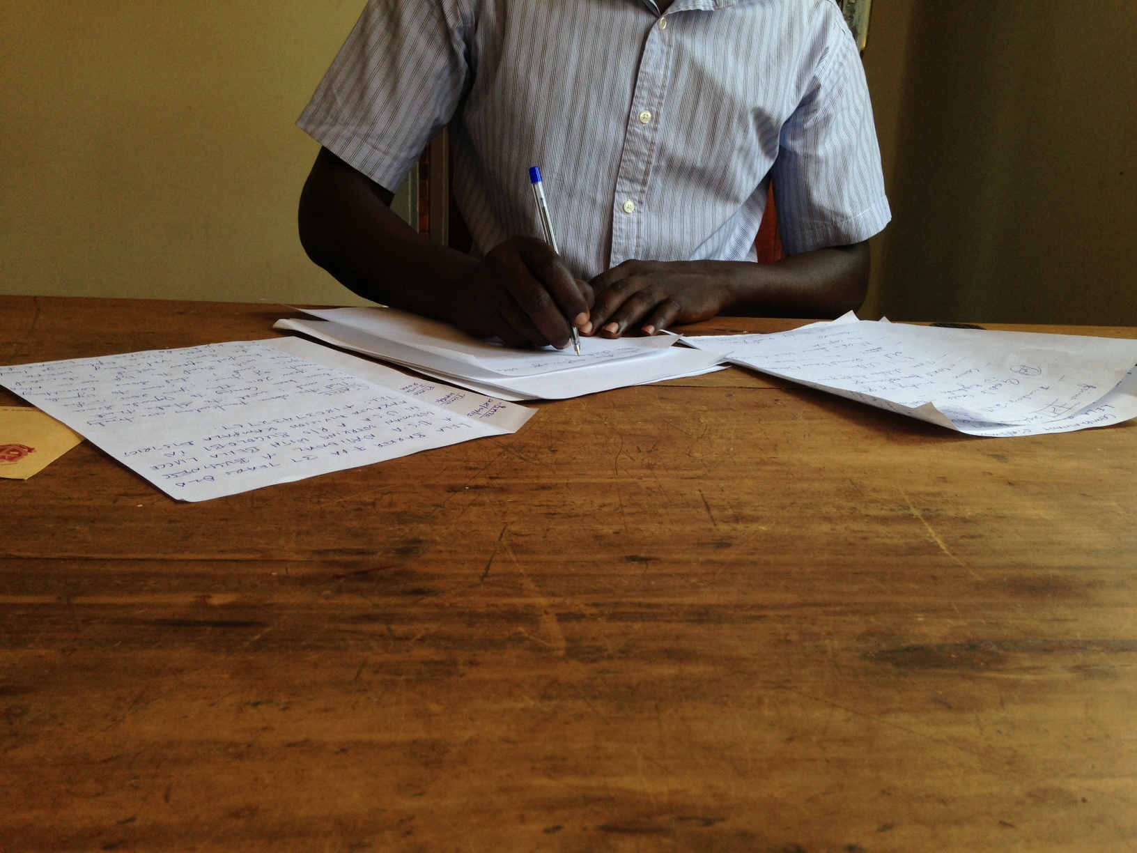 Making statements at the local police station in Uganda