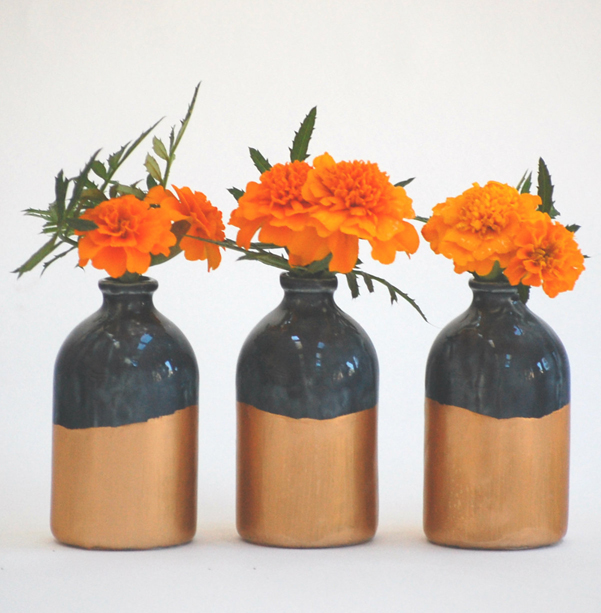 Gold dipped vases handmade by artist, Courtney, of Honeycomb Studio
