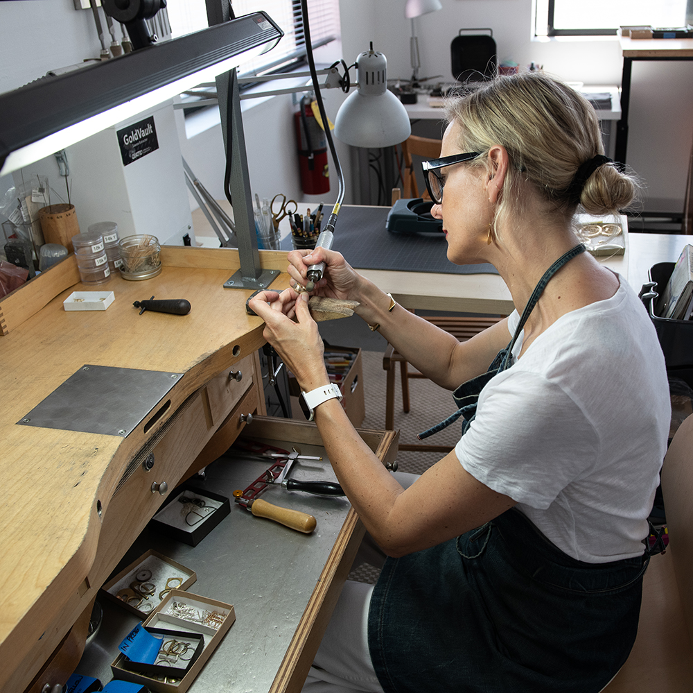 Marja creating jewelry for MGG studio