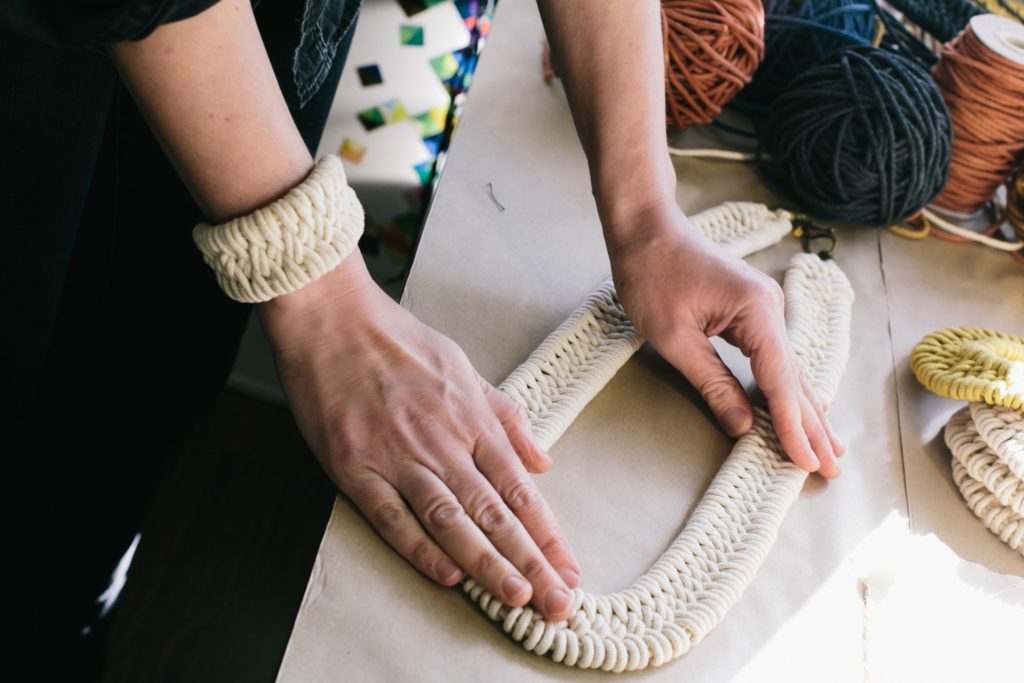 Lucky break Meet the Maker Zelma Rose pressing a hand woven necklace
